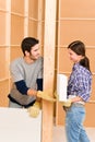 Home improvement young couple building brick wall Royalty Free Stock Photo