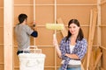 Home improvement: young couple fixing new house