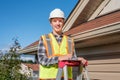 Home inspector providing an inspection to a house.