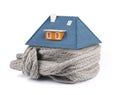 Home insulation concept. scarf around the house Royalty Free Stock Photo