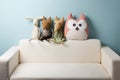 Home interior. Childhood. Blue background. Toy sitting on a couch. Copy space. Royalty Free Stock Photo