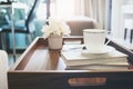 Home Interior with Coffee cup Book white flower on tray table