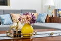 Home interior decor,golden metal deer, bouquet in vase Royalty Free Stock Photo