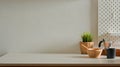 Home interior design with mixed bowl, coffee pot, mug, plant pot and copy space