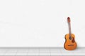 Home interior - Electric classic guitar in front of white wall Royalty Free Stock Photo