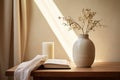 Home interior. Living room interior with books, ceramic vase with dried flowers and window.