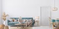 Home interior mock-up with blue sofa, wooden table and decor in white living room Royalty Free Stock Photo