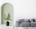 Home interior mock-up with gray sofa and green vase in bright living room, copy space