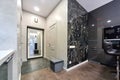 home interior, modern hallway in black and white colors with marble walls