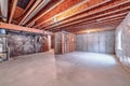 Home interior under construction with wooden framework and air condiioning ducts