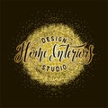 Home interiors design studio lettering on golden texture