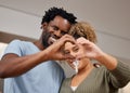 Home interprets heaven. Home is heaven for beginners. a young couple showing keys to their new home. Royalty Free Stock Photo