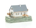 House and stack of dollars Royalty Free Stock Photo