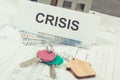 Home keys, euro and inscription crisis on housing plan. Real estate crisis caused by coronavirus