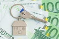 Home Keys And A Small House On Currencies Euro Background