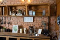 Home kitchen decor in retro style. Brick wall. Wooden shelves and table Royalty Free Stock Photo