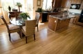 Home kitchen interior with hardwood flooring Royalty Free Stock Photo