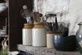 Home kitchen still life: Vintage coffee pot, enamel mugs and ant Royalty Free Stock Photo