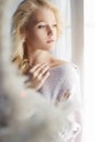 Home lifestyle girl looking in window Royalty Free Stock Photo