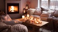 Home living room on a winter evening with cozy fireplace in style of Hygge. Soft blankets and cushions on the sofas Royalty Free Stock Photo