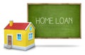 Home loan text on blackboard with 3d house