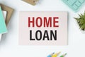 Home Loan text on paper on write background.