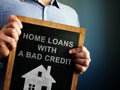 Home loans with bad credit written on a blackboard