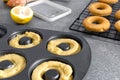 Home made baking concept, donut dough, donuts, eggs, lemon, kitchen utensils Royalty Free Stock Photo