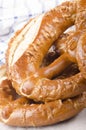 Home made bavarian prezel on baking paper Royalty Free Stock Photo