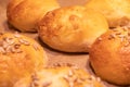 Home made bread rolls or buns for breakfast fresh on a paper on a table, selected focus, narrow depth of field Royalty Free Stock Photo
