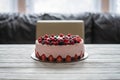 Home made cake with berries. Cake with Strawberry, blackberry, blueberry, and raspberry on a table Royalty Free Stock Photo