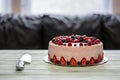 Home made cake with berries. Cake with Strawberry, blackberry, blueberry, and raspberry on a table Royalty Free Stock Photo