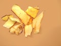 Home made cassava chips Keripik singkong with a brown background