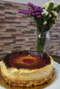 Home made cheesecake and flowers Royalty Free Stock Photo