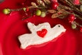 Home made Christmas cookie on red plate Royalty Free Stock Photo