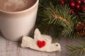 Home made Christmas dove heart cookie with hot chocolate Royalty Free Stock Photo