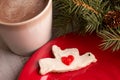 Home made Christmas dove heart cookie with hot chocolate Royalty Free Stock Photo