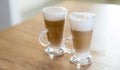 Home made coffee Cafe Macchiato on wooden table. Royalty Free Stock Photo