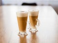 Home made coffee Cafe Macchiato on wooden table. Royalty Free Stock Photo