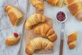 Home made croissant with jam on a table Royalty Free Stock Photo