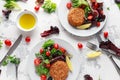 Home made Fish Cake salmon, spinach and potato. served on plate with vegetables Royalty Free Stock Photo