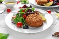 Home made Fish Cake salmon, spinach and potato. served on plate with vegetables Royalty Free Stock Photo