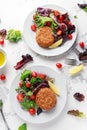 Home made Fish Cake salmon, spinach and potato. served on plate with vegetables Royalty Free Stock Photo