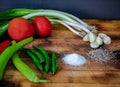 Home made green onions and Tomatoes . Spicy Green Pepper. garlic Royalty Free Stock Photo