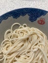 Home made hand pulled noodles in bowl with auspicious clouds Royalty Free Stock Photo