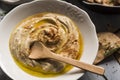 Home made humus with bread and olives