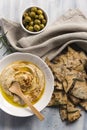 Home made humus with bread and olives