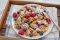 Kaiserschmarrn - traditional austrian pancake dessert with fresh fruit Royalty Free Stock Photo