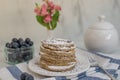 Home made lemon pancakes with poppy seeds on a breakfast table Royalty Free Stock Photo