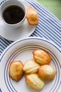 Home made Madeleine cookies, coffee cup